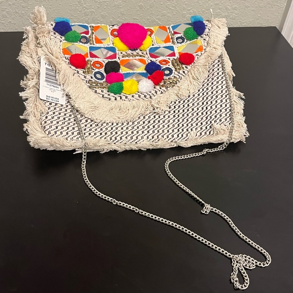 CIRCUS BY SAM EDELMAN POM POM CROSSBODY, sold at Torrid